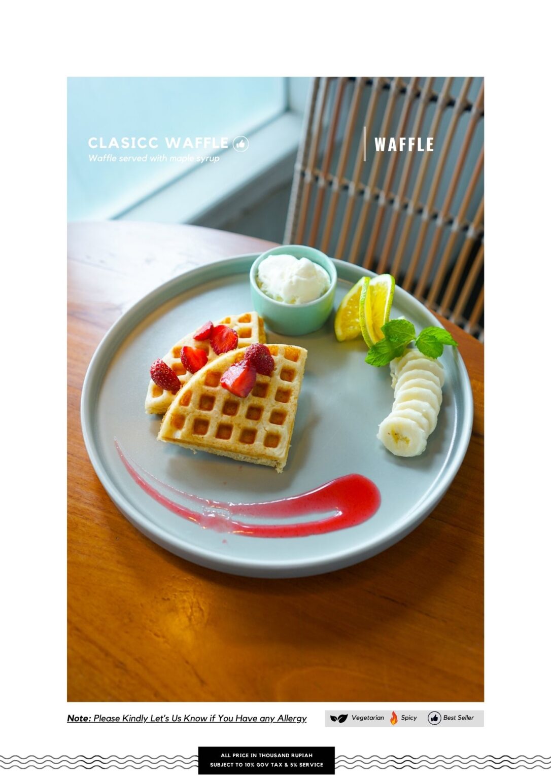 Golden waffle topped with fresh strawberries and lime served at Gangga Coffee Bali